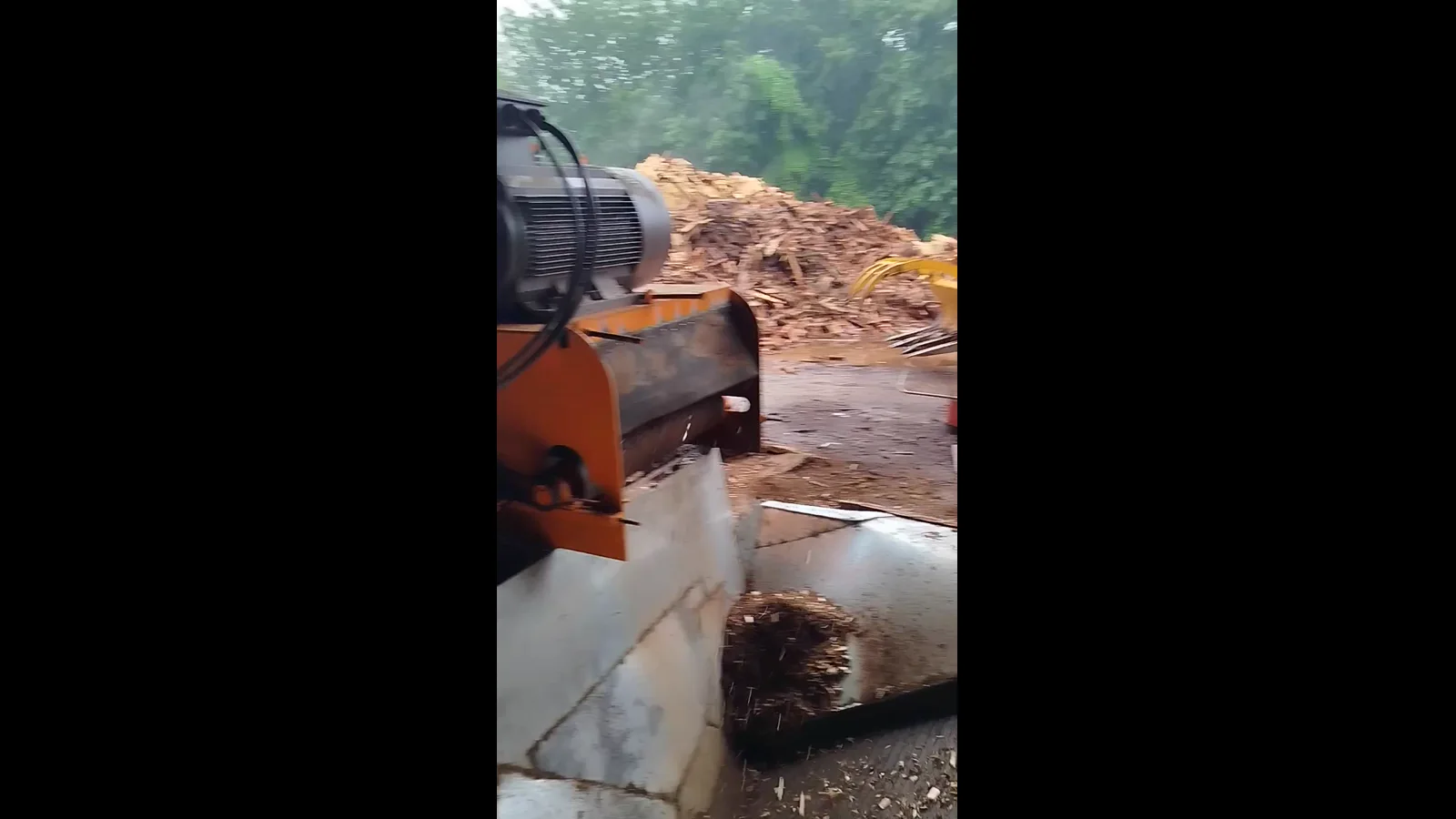 Loader feeding wood material at the Vietnam customer site